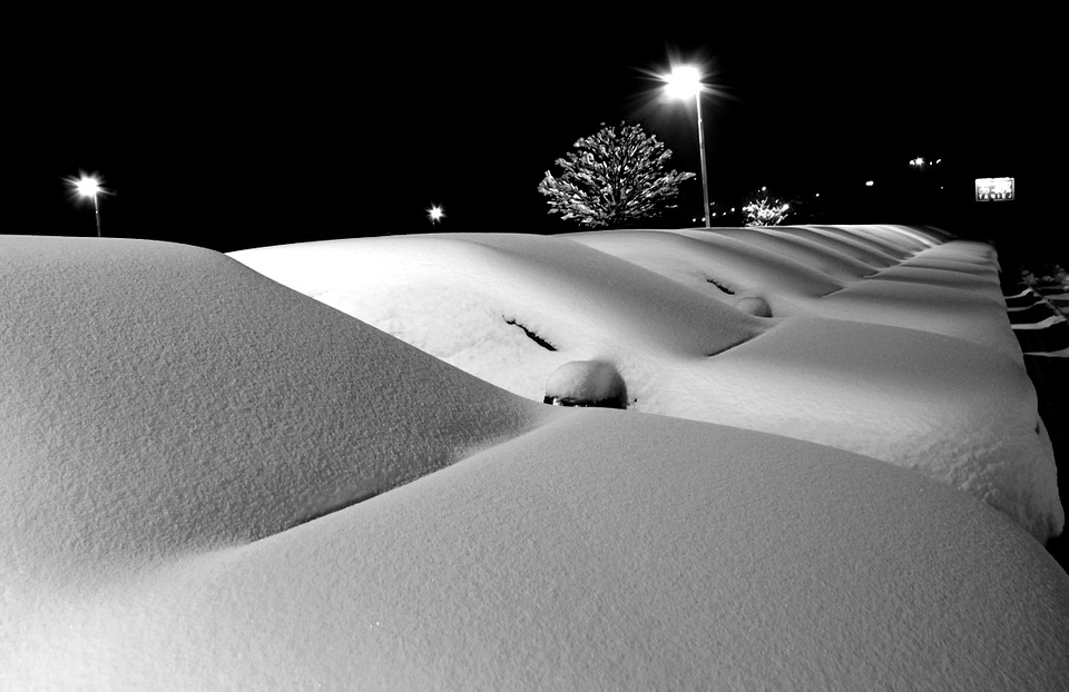 snow covered cars
